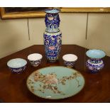 Chinese floral patterned enamel baluster shaped vase, three similar bowls and a Japanese cloisonné