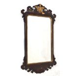 Georgian style mahogany fret framed wall mirror, the pediment with carved giltwood bird decoration