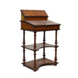 Late Victorian walnut and beech davenport type desk standing on turned supports united by