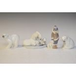 Four Lladro figures - Eskimo Boy With Pet, Bearly Love, Polar Bear (1207) and Polar Bear (1209)