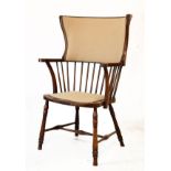 Early 20th Century mahogany and beech framed wing back open arm occasional chair having