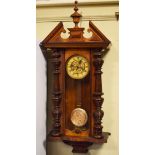 Late 19th Century walnut and beech cased Vienna style wall clock, the dial with Roman numerals