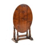Good quality reproduction distressed oak oval top folding occasional table standing on bobbin turned