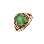 Yellow metal signet ring set jade panel, the shank stamped 18k, size K½, 3.1g approx gross