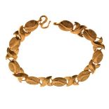 Oriental unmarked yellow metal fancy link bracelet, 23.4g approx Condition: