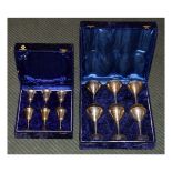 Two sets of six silver plated goblets, cased Condition: