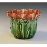William Ault green red and off-white glazed majolica jardinière having typical moulded decoration