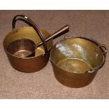 Two heavy brass preserve pans and another brass pan Condition: