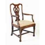 George III mahogany open arm elbow chair having a pierced vase shaped back splat, drop-in seat and