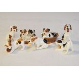 Collection of seven Royal Doulton Character Dog figures comprising: HN.1097, HN.1099, HN.1103, HN.