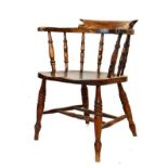 Beech and elm smoker's bow type open arm elbow chair on turned supports united by stretchers