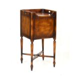 Good quality reproduction mahogany tray top bedside cupboard standing on turned supports united by a