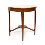 String inlaid and crossbanded mahogany circular top occasional table standing on tapered square