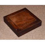 19th Century mahogany stationery box, the hinged cover opening to reveal a partially fitted interior