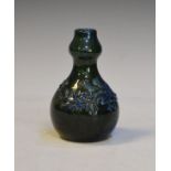 Small Elton Ware baluster shaped vase having typical foliate decoration on a blue/green ground, 14cm