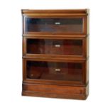 Early 20th Century mahogany Globe Wernicke three tier sectional bookcase having glazed up-and-over