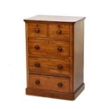 Small Victorian mahogany chest of two short and three long drawers on a plinth base Condition: