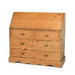 Reproduction Victorian style natural pine bureau, the fall flap opening to reveal a fitted interior,