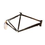Chris Boardman aluminium mountain bike frame, a steel framed mountain bike frame in pearlescent