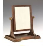 Victorian mahogany dressing table mirror having a reeded frame, conforming scroll supports and