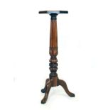 Mahogany octagonal topped torchère standing on a turned and carved pillar and tripod base Condition: