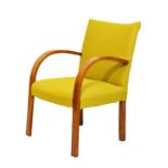 1930's period beech framed open arm fireside chair upholstered in yellow tweed and standing on