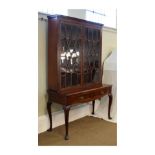 Georgian style mahogany cabinet bookcase, the upper section fitted four shelves enclosed by a pair