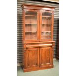 Victorian mahogany two section bookcase, the upper section fitted four shelves enclosed by a pair of