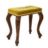 Rectangular topped dressing stool having a stuffed seat and standing on carved cabriole supports