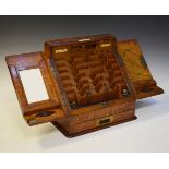 Early 20th Century oak slope front stationery box by Parkins & Gotto of London, the hinged doors