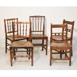Pair of 19th Century ash country made side chairs, each having a bobbin turned spindle back, rush