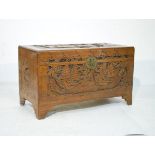 Oriental carved camphor wood chest having hinged cover, 101cm wide Condition: