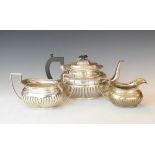 Victorian matched three piece silver tea set, the teapot and sugar basin Chester 1895, the cream jug
