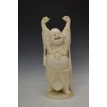 Modern resin figure of a smiling Buddha with arms above his head Condition: