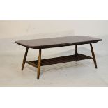 Ercol dark elm rectangular coffee table with slatted under tier Condition: