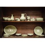 Collection of modern Wedgwood green jasperware items including vases, jug, pin dishes, plates, boxes