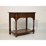 Good quality reproduction oak rectangular topped side table, fitted two drawers to the frieze and