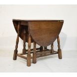 Mid 20th Century oak oval gate leg dining table Condition: