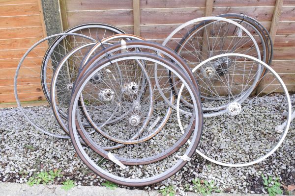 Three pairs of racing cycle wheels having large flange hubs and one other pair of racing cycle