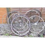 Three pairs of racing cycle wheels having large flange hubs and one other pair of racing cycle