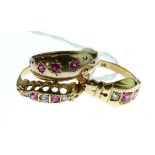 18ct gold dress ring set three diamonds and two ruby coloured stones, a 9ct gold dress ring set