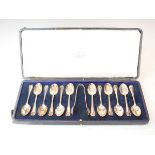Set of twelve George V silver coffee spoons with matching tongs, Sheffield 1916/1917, 6.3oz