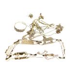 Gold coloured metal bracelet depicting African Safari animals, a 9ct gold knot design ring,