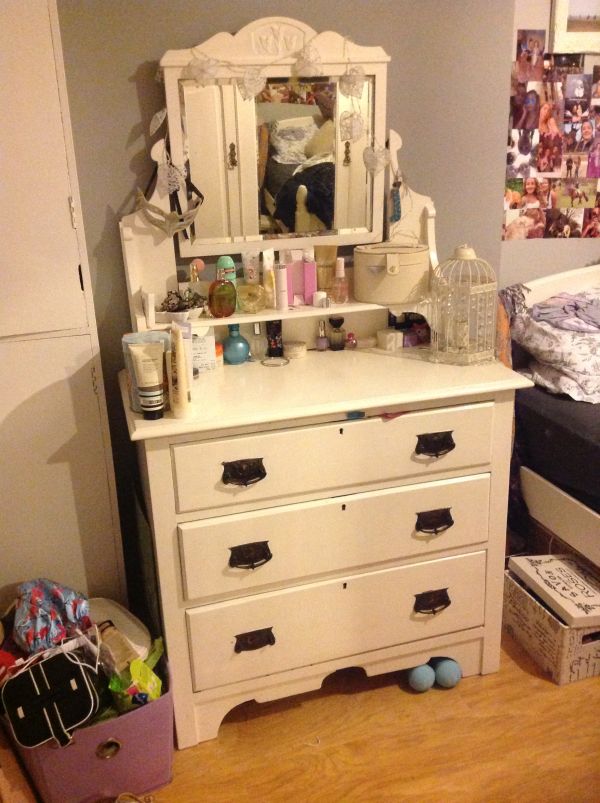 Edwardian white painted dressing chest, the raised back fitted swing mirror and open shelf, the base