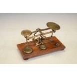 Set of brass postage scales with weights by Smiths Of London Condition: