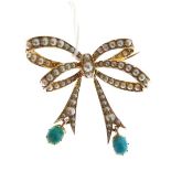 Seed pearl and turquoise set articulated bow design brooch stamped 15ct Condition: