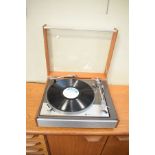 Leak Delta Lenco turntable in a teak and brushed aluminium finish case Condition: