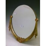Art Deco period circular easel dressing table mirror with gilt swag and floral decoration Condition: