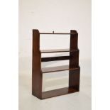 Mahogany four tier waterfall hanging bookshelf Condition: