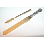 Early 20th Century ivory page turner/paperknife with embossed white metal handle, together with a